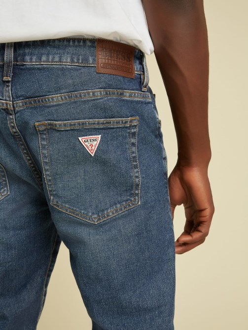 بنطلون جينز ضيق أزرق Guess