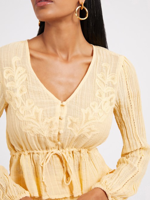 بلوزة صفراء مطوي Guess
