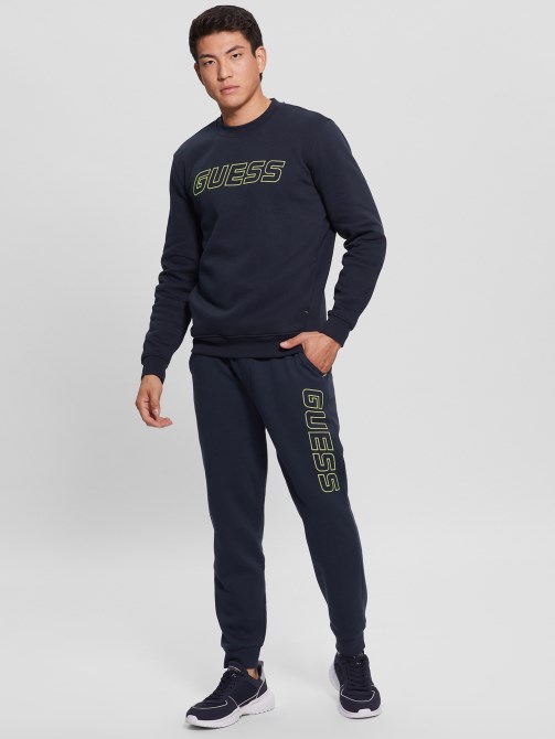 كنزة صوفية حريرية زرقاء وشعار Boniface Guess