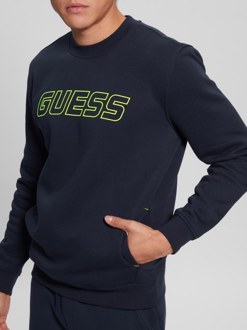 كنزة صوفية حريرية زرقاء وشعار Boniface Guess