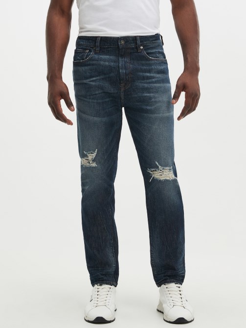 Globetrotter Guess بنطلون جينز ممزق مستدق