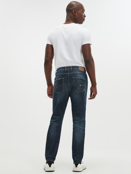 Globetrotter Guess بنطلون جينز ممزق مستدق