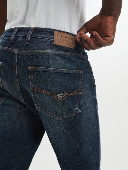 Globetrotter Guess بنطلون جينز ممزق مستدق